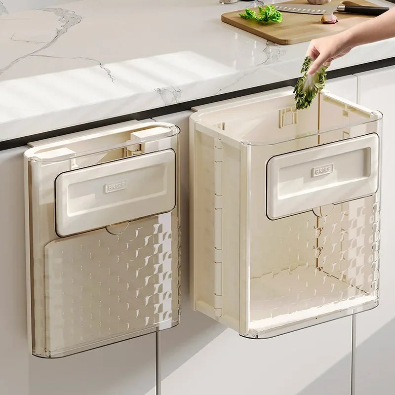 Image of a folding wall mounted trash can in a kitchen setting