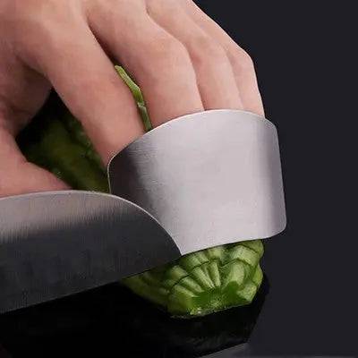 Stainless steel finger guard for safe knife handling in the kitchen
