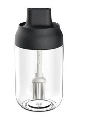Professional kitchen supplies showcased in elegant glass spice holders