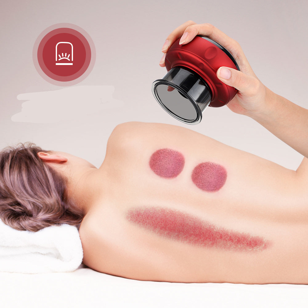 Electric Cupping Massager in use on back, showing suction - Iris Essentials
