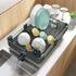 Over sink dish rack featuring a quick drain system for effective drying