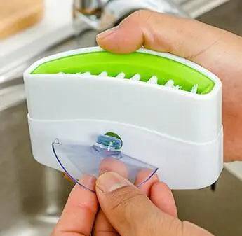 Versatile scrub brush designed for kitchen pot and pan cleaning