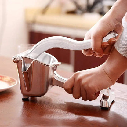 Ergonomic handheld lemon squeezer for citrus juice without pulp