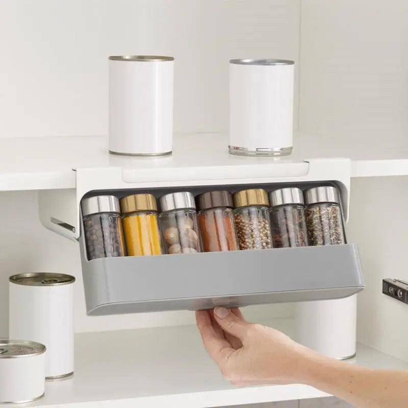 Convenient spice bottle storage solution to declutter countertops  