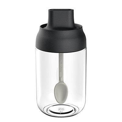 Stylish glass seasoning jar with a lid for preserving spice freshness  