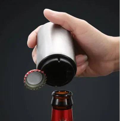 Automatic beer bottle opener in action  