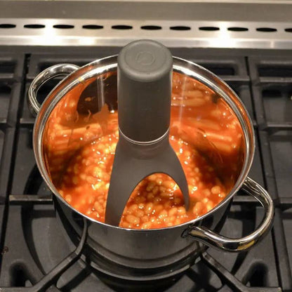 Automatic cooking mixer demonstrating hands-free cooking technology