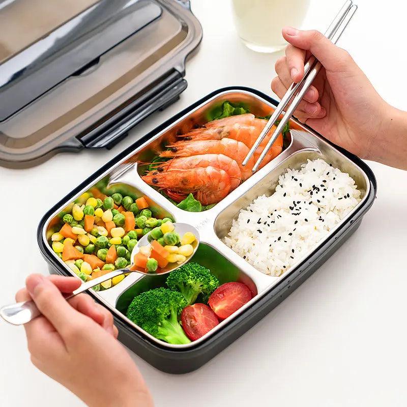 Close-up of the food-grade stainless steel container with a cutlery set inside for convenient meals  