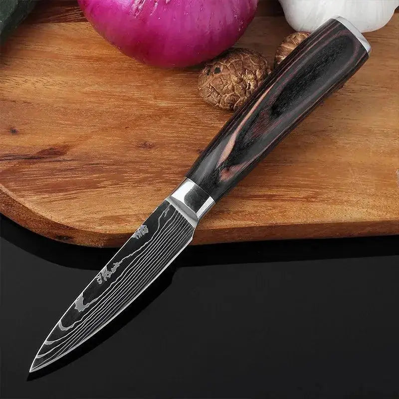 Precision cutting tools including a Japanese Santoku knife  